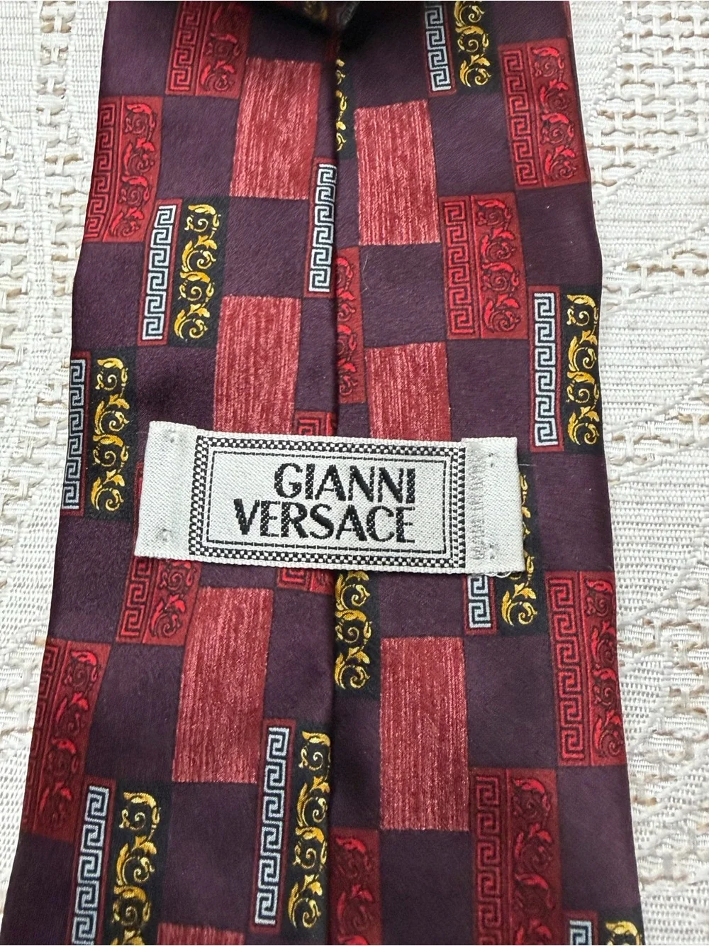Versace Men's Burgundy and Black Checkerboard Silk Tie with Gold Accents vintage